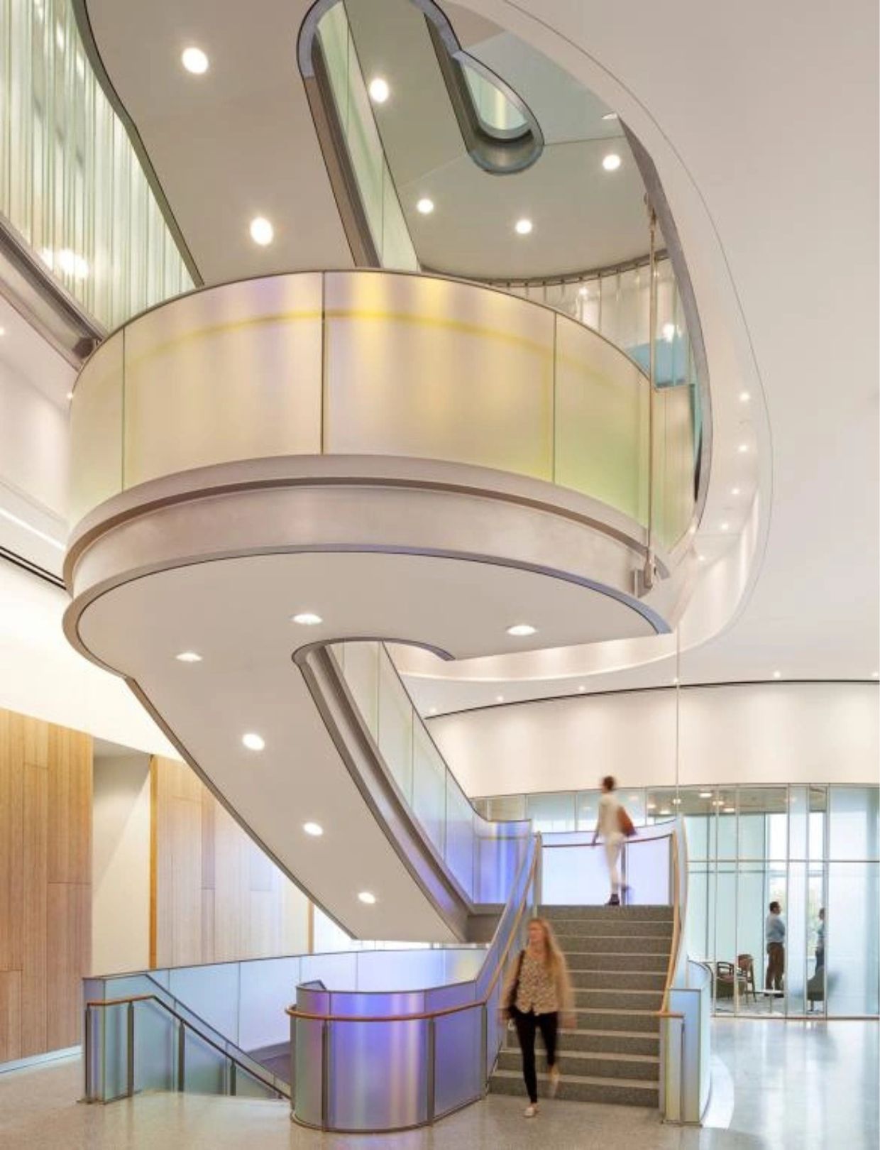 Main stairs in the CUNY ASRC lobby, people walking up/down